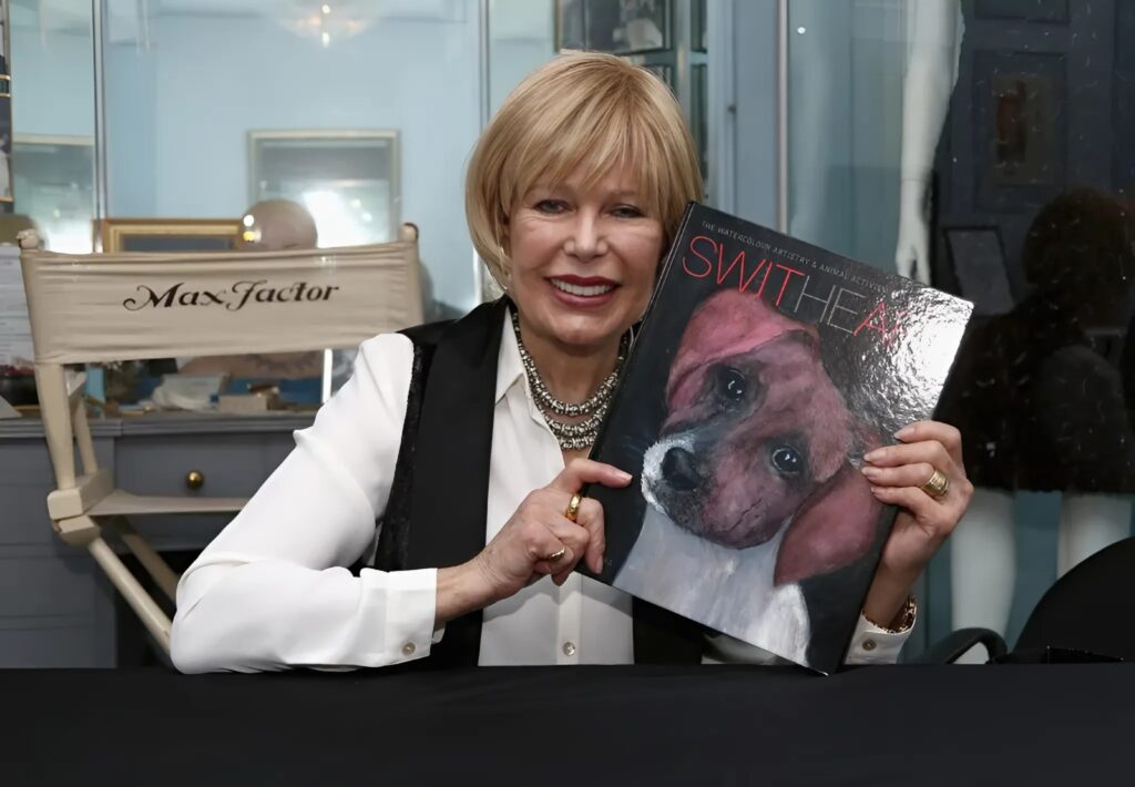 Loretta Swit painting for her SwitHeart Animal Alliance, showcasing her activism with a compassionate touch