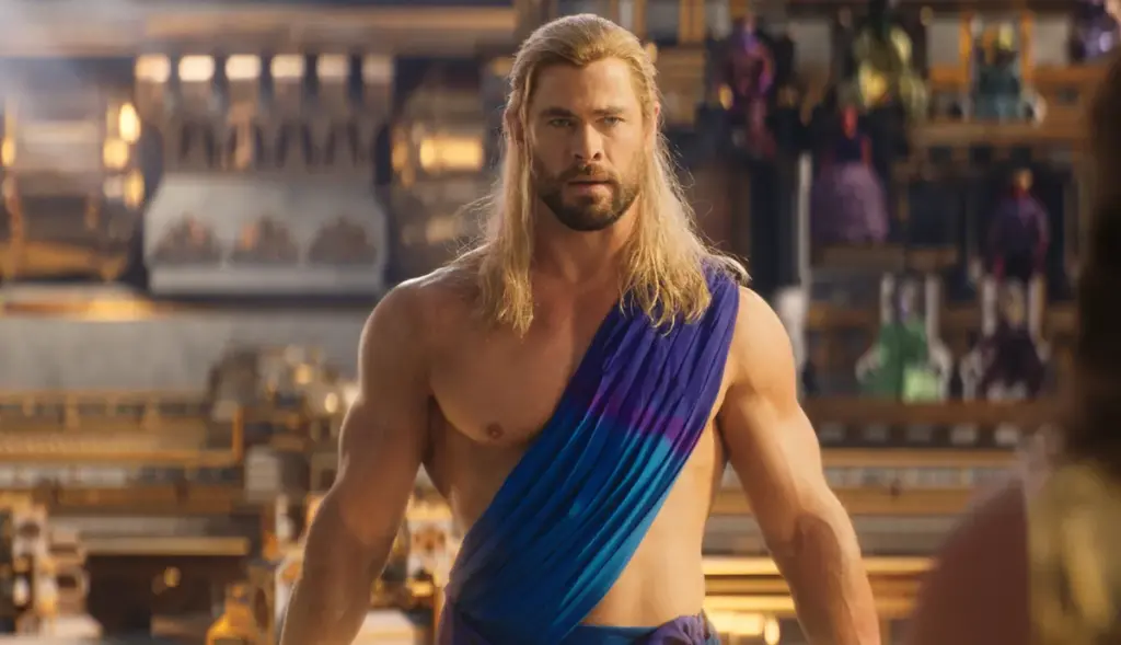 Chris Hemsworth as Thor, chiseled and cocky in Thor: Ragnarok.