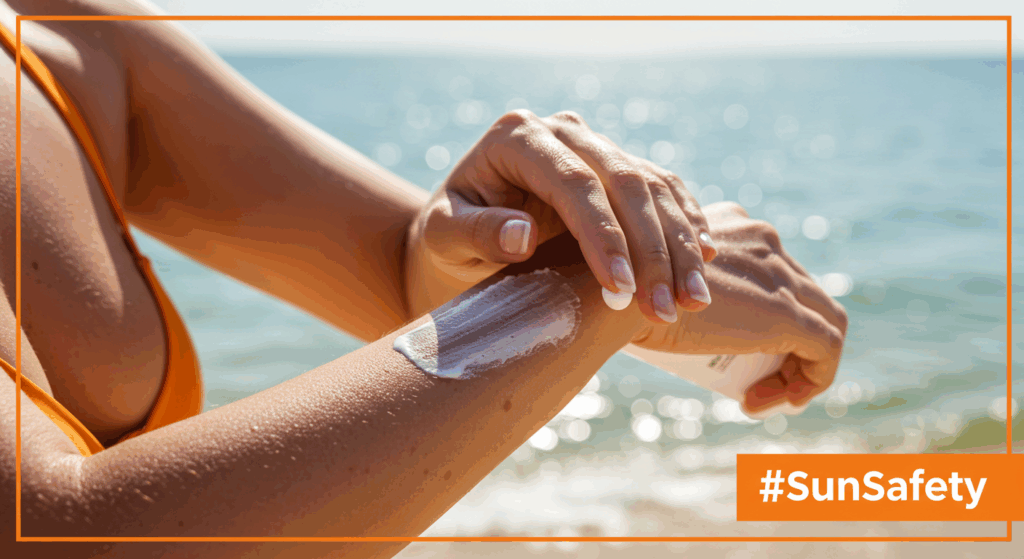 A close-up of a person applying SPF 50 sunscreen on their arm, with a sunny beach backdrop and #SunSafety logo in bold oranges, showcasing essential skin defense.