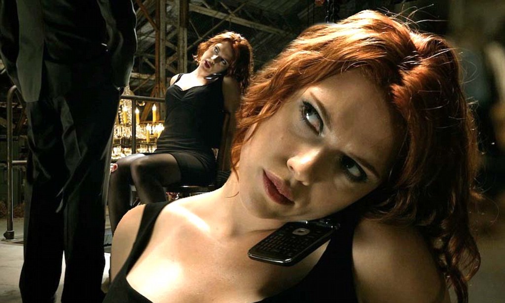 Scarlett Johansson as Black Widow, commanding in The Avengers.